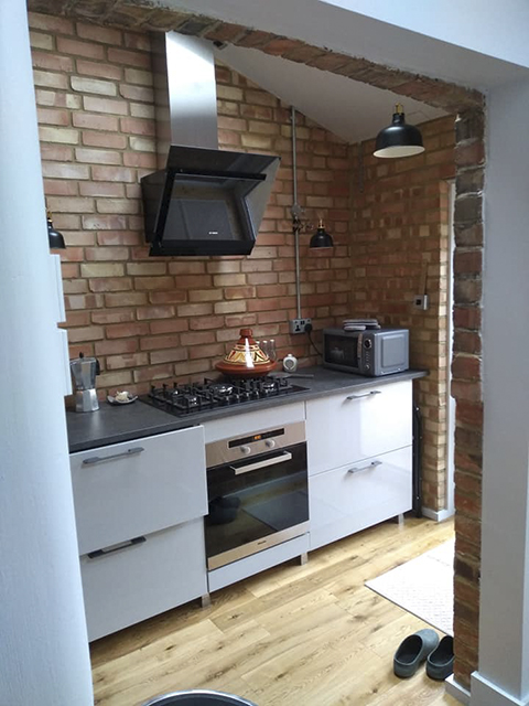 Kitchen with exposed brick wall, Northcroft Terrace