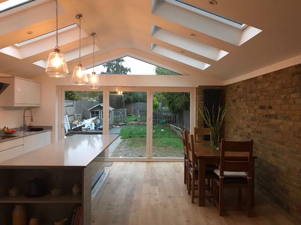 Kitchen extension with rooflights and exposed brick, Courthope project